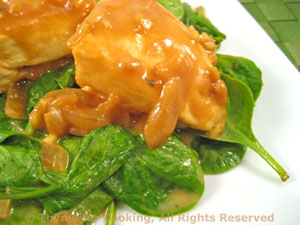 Chicken with Ginger-Peanut Sauce on Warm Spinach