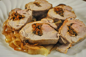 Stuffed Pork Tenderloin on Caramelized Onions