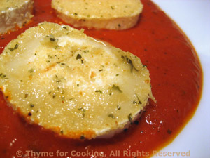 Baked Goat Cheese with Red Pepper Sauce