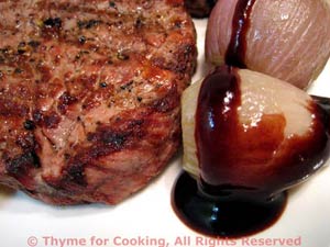 Steak with Roasted Garlic and Red Wine Reduction