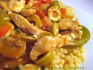 Turkey with Peppers, Feta and Olives over Couscous